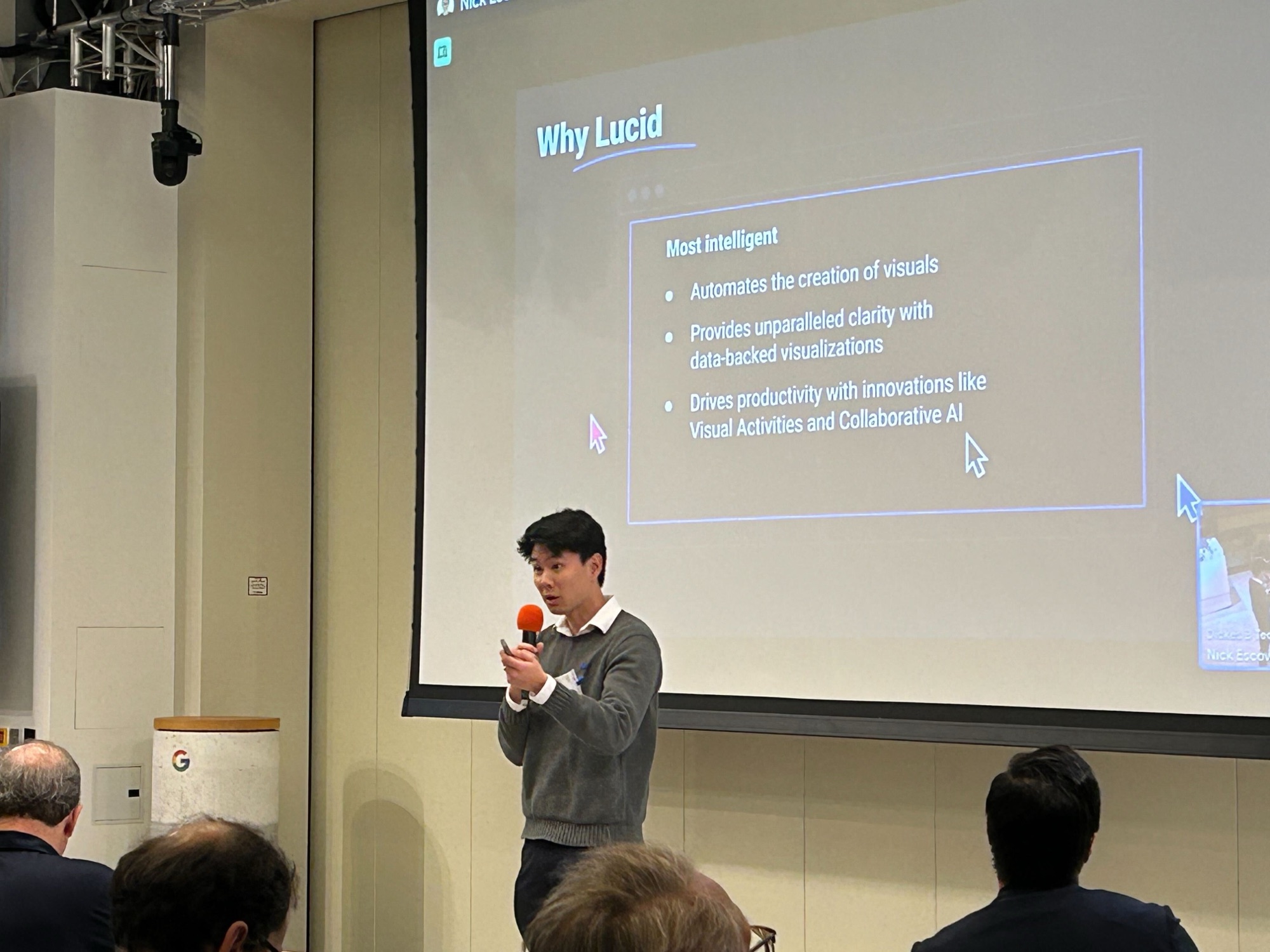 Preston Chin presenting to a seated audience